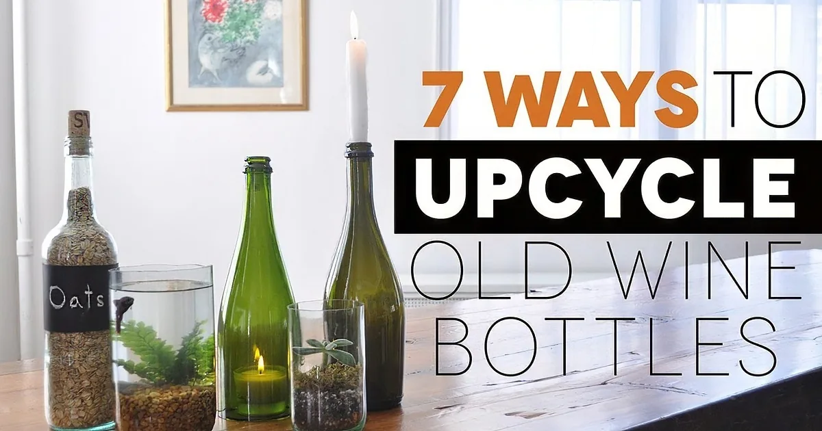 Wine bottles repurposed into planters, candle holders, and decorative items on a wooden table.