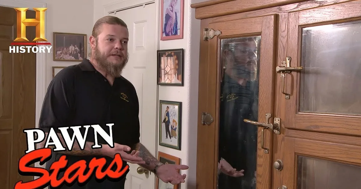 A man with a beard stands in front of a door, gesturing, with "Pawn Stars" text overlay.