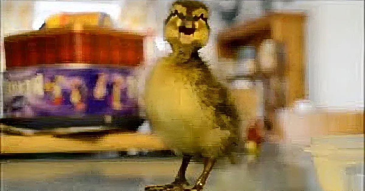 A fluffy duckling with a surprised expression stands in a room with toys and furniture.