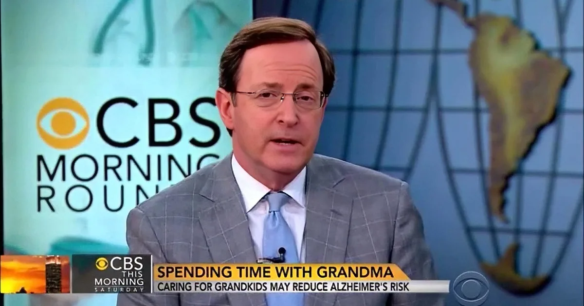 A man in a suit and tie is on a CBS Morning News show discussing the benefits of spending time with grandparents.