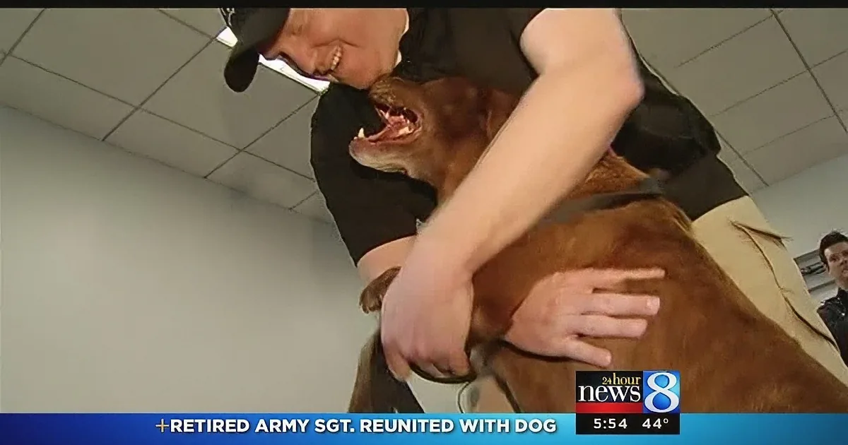A retired Army Sgt. is joyfully reunited with his dog, both smiling and embracing.