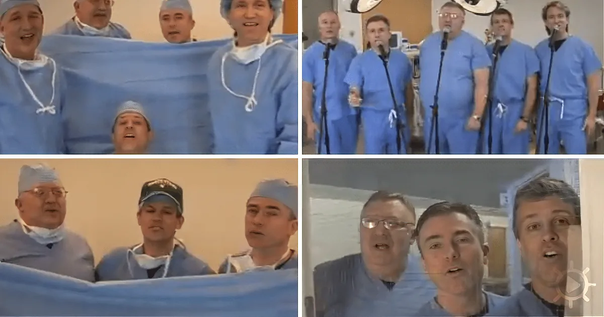 A group of medical professionals in scrubs and surgical caps are singing together.