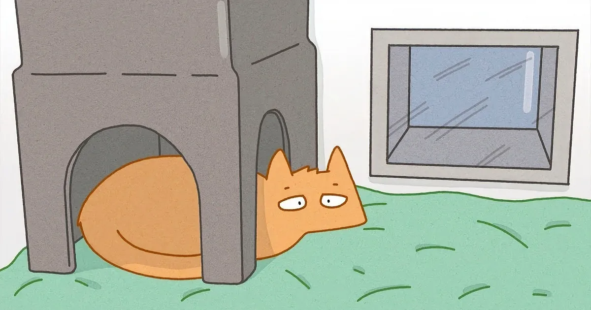An orange cat lies in a gray cat house, looking tired or bored, with a microwave nearby.
