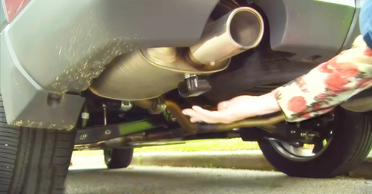 A car's exhaust pipe is shown in three different angles, with water dripping from it.