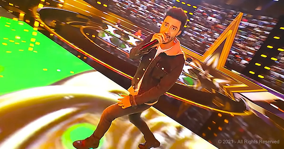 A man in a denim jacket and jeans is performing on stage, holding a microphone, with a large audience and colorful stage...