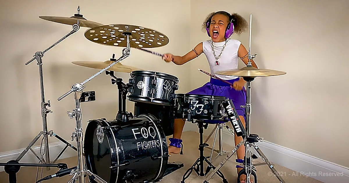 Daring Young Girl With Lightning-Fast Reflexes Challenges Famous Drummer (And She Crushes Him)