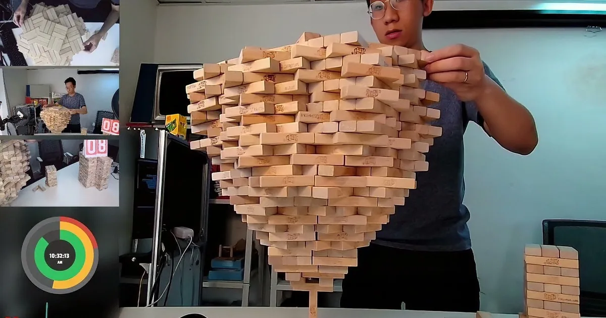 A towering stack of wooden blocks is precariously balanced on a shelf, resembling a human head.