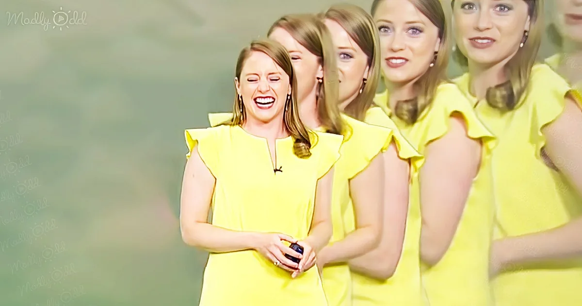 A woman in a yellow dress is laughing, surrounded by multiple blurred images of herself.