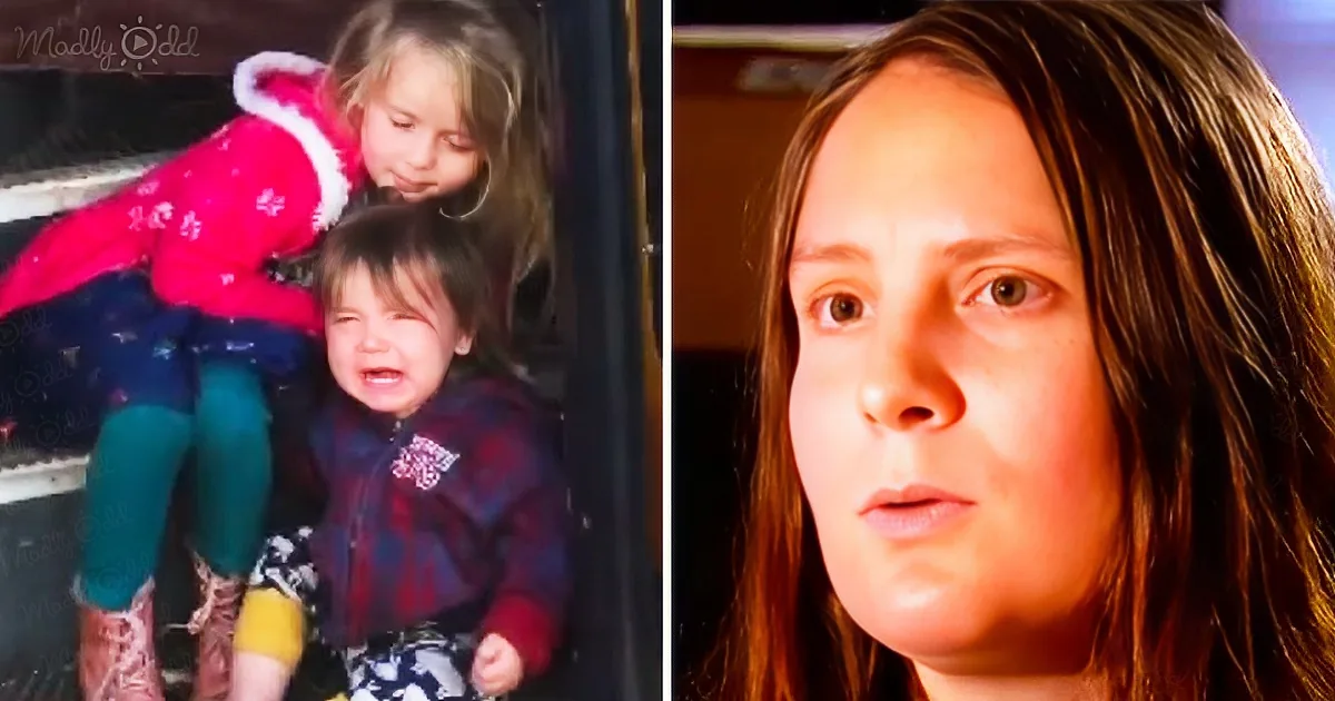 A woman with long brown hair looks concerned, while a young girl in a pink coat and another in a plaid jacket sit...