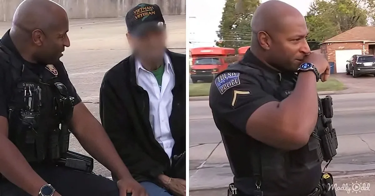 A police officer in a Tulsa uniform interacts with a man wearing a Vietnam Veteran hat in an outdoor setting.