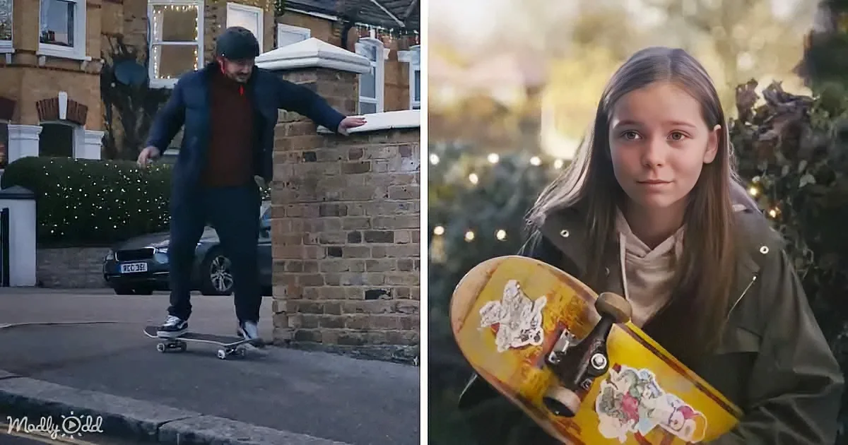 A man skateboards on a brick wall while a girl holds a skateboard with stickers, both in a suburban setting.