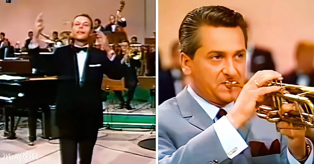 A man in a tuxedo stands in front of a band, holding a trumpet, with another man playing trumpet in the foreground.
