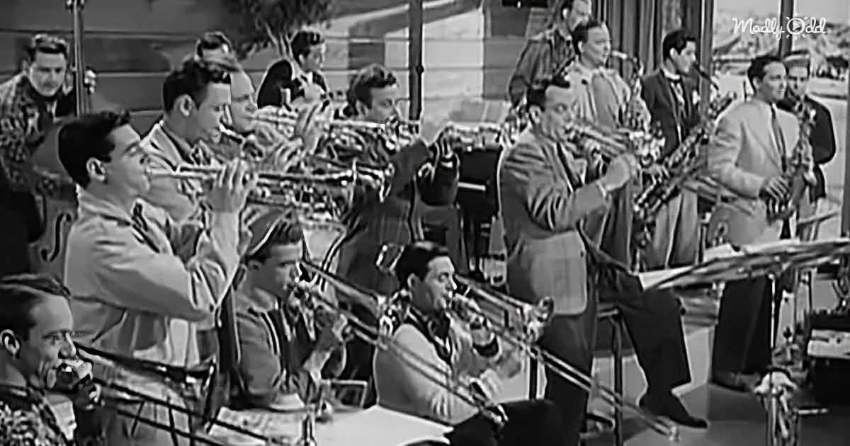 A jazz band in formal attire plays instruments, with trumpets and trombones prominently featured.