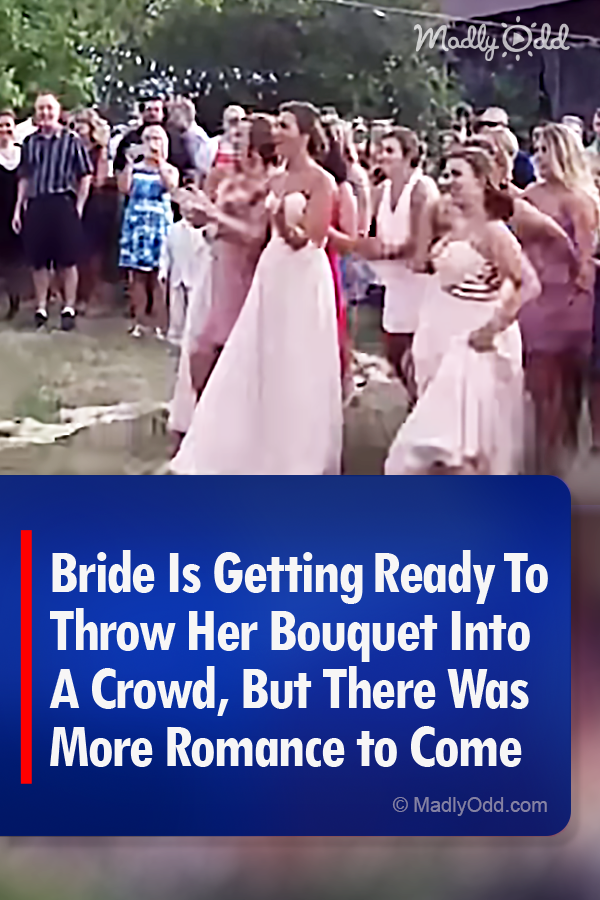 Bride Is Getting Ready To Throw Her Bouquet Into A Crowd. But There Was More Romance to Come