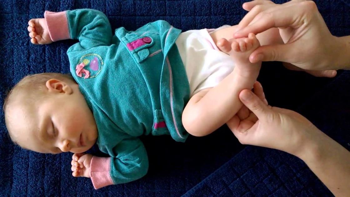 Woman Lays Young Baby On Her Back. What She Does To Relax Her Is