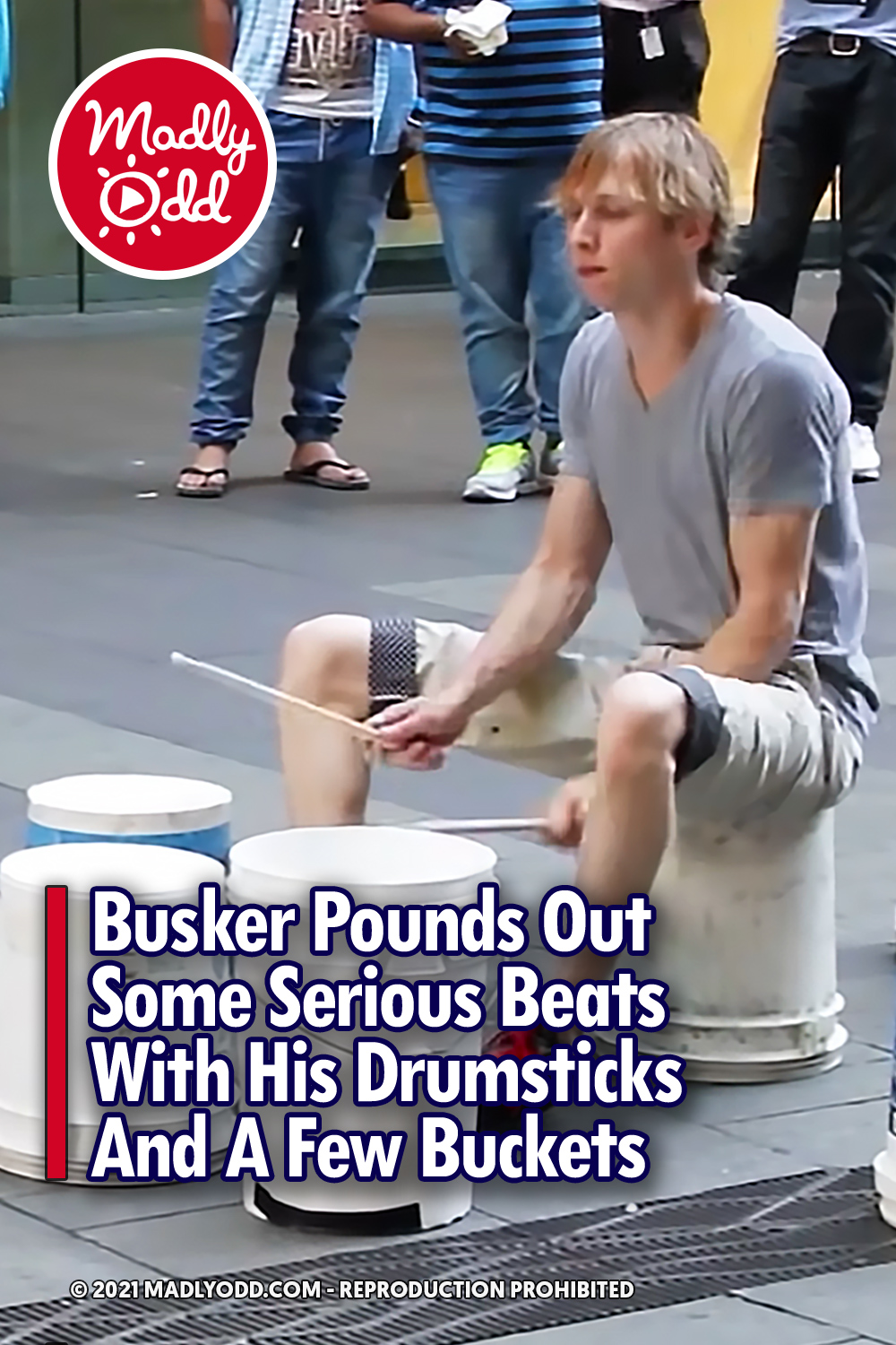 Busker Pounds Out Some Serious Beats With His Drumsticks And A Few Buckets