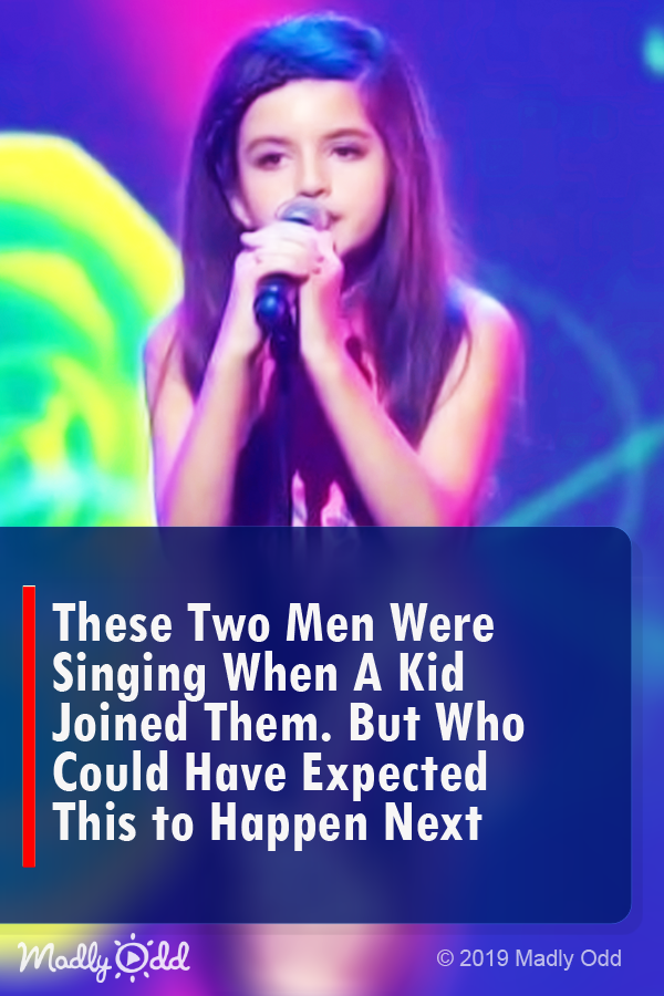 These two men were singing when a kid joined them. But who could have expected this to happen next