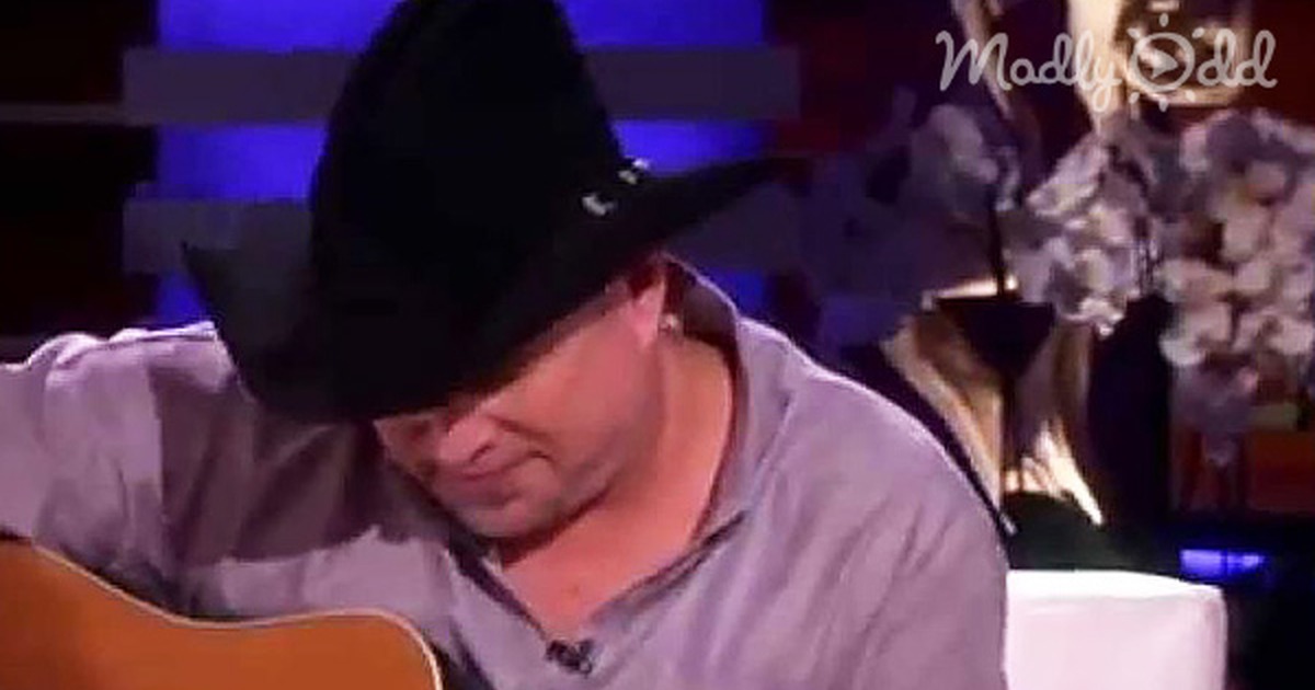 Garth Brooks plays guitar on Ellen show, text hints at emotional moment with "Mom" song.