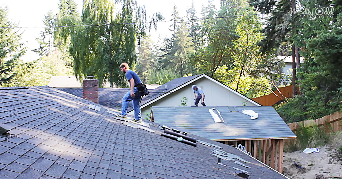 63210-OG1-Two-Hard-Working-Roofers-Cant-Help-But-Move-To-The-Beat-When-The-Music-Starts-Playing