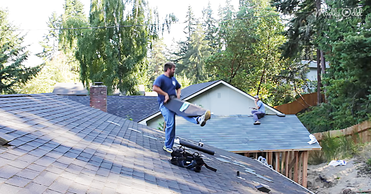 63210-OG3-Two-Hard-Working-Roofers-Cant-Help-But-Move-To-The-Beat-When-The-Music-Starts-Playing