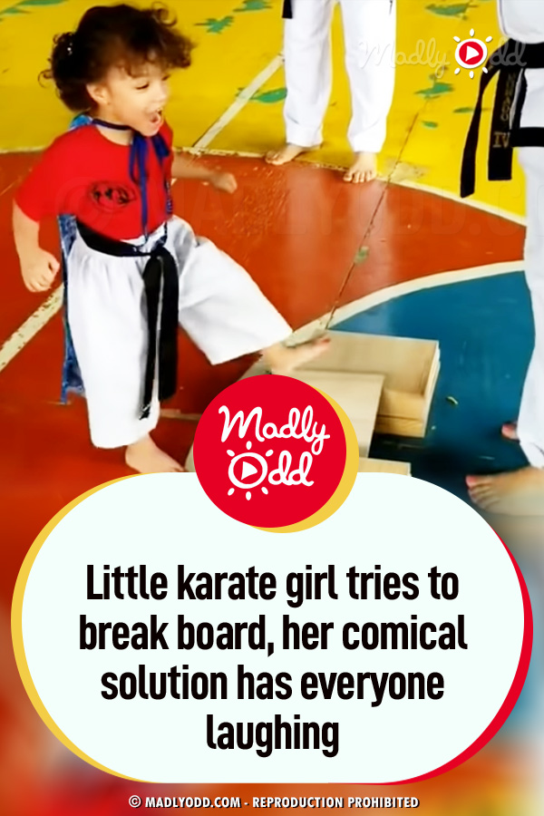 Little karate girl tries to break board, her comical solution has everyone laughing