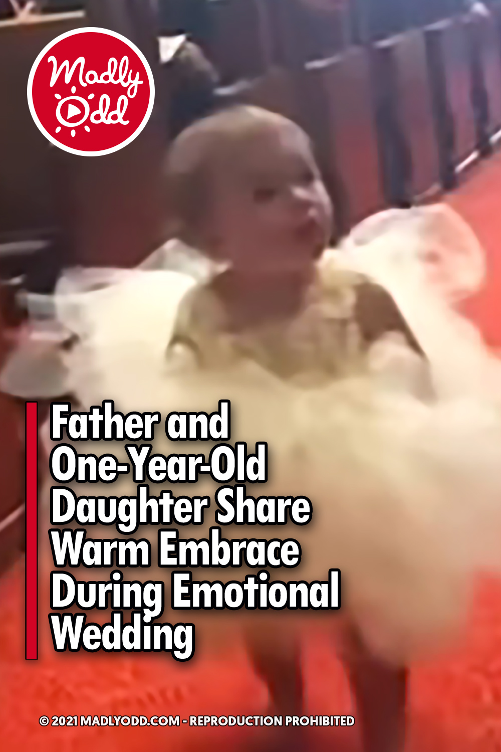 Father and One-Year-Old Daughter Share Warm Embrace During Emotional Wedding