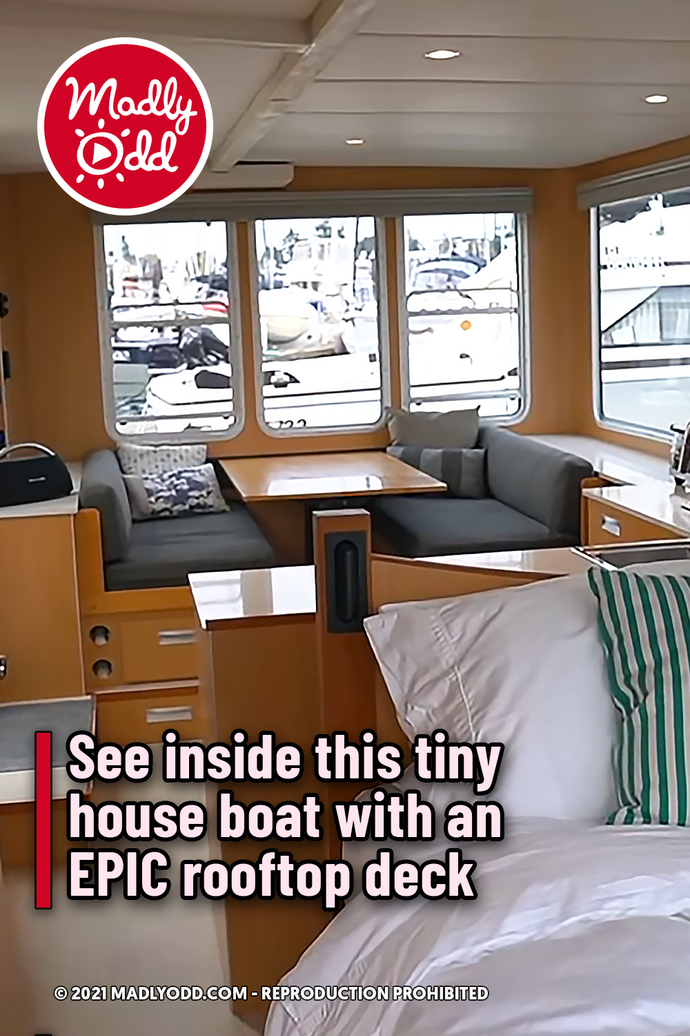 See inside this tiny house boat with an EPIC rooftop deck