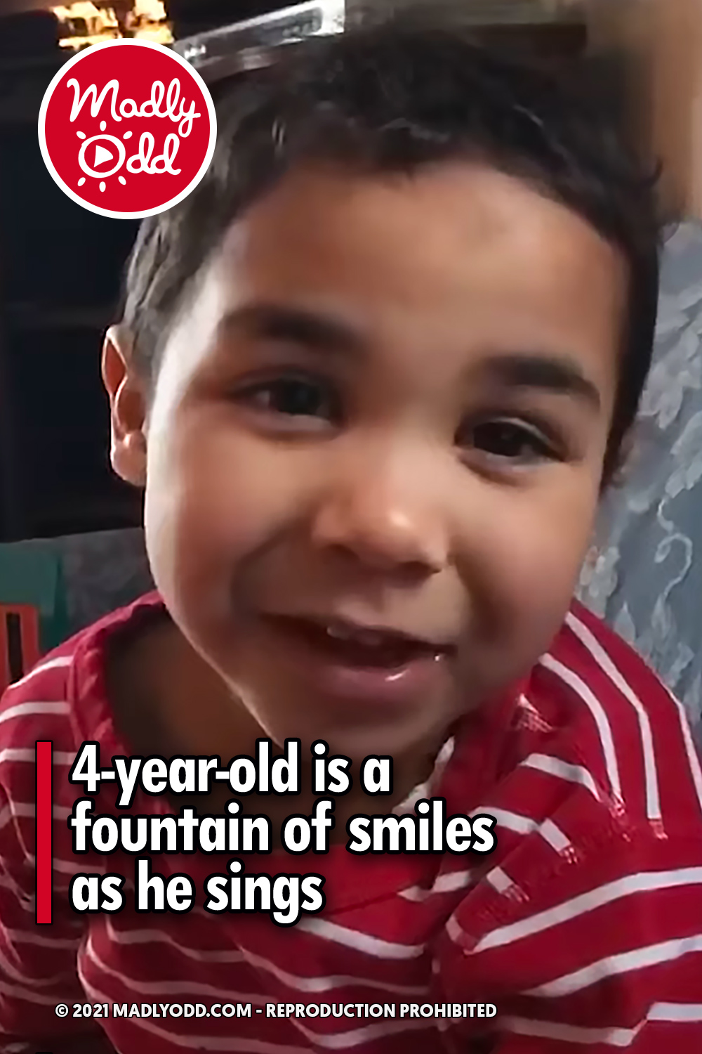 4-year-old is a fountain of smiles as he sings