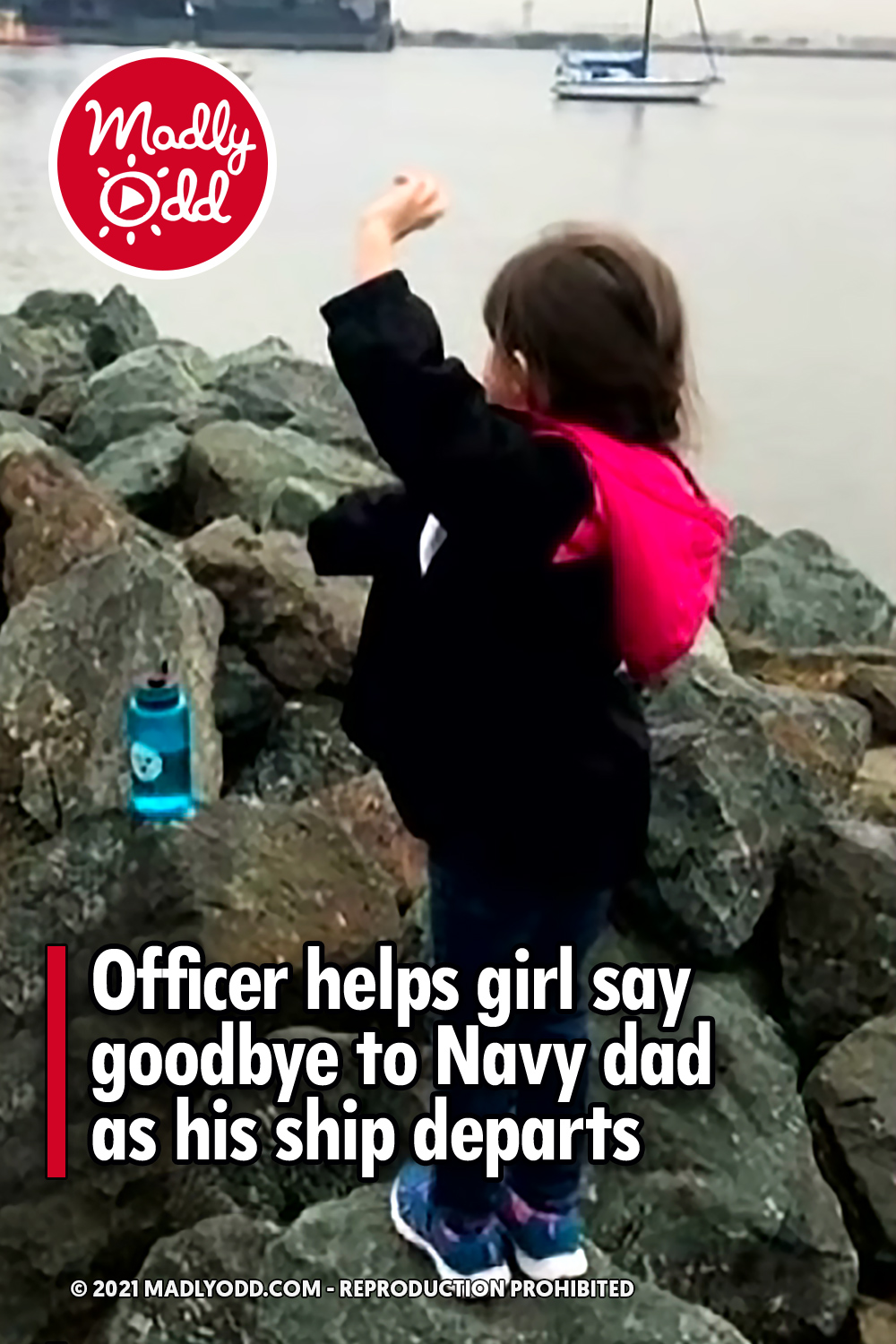 Officer helps girl say goodbye to Navy dad as his ship departs