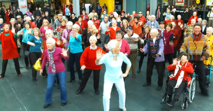 An elderly group of people surprise everyone with a flash mob