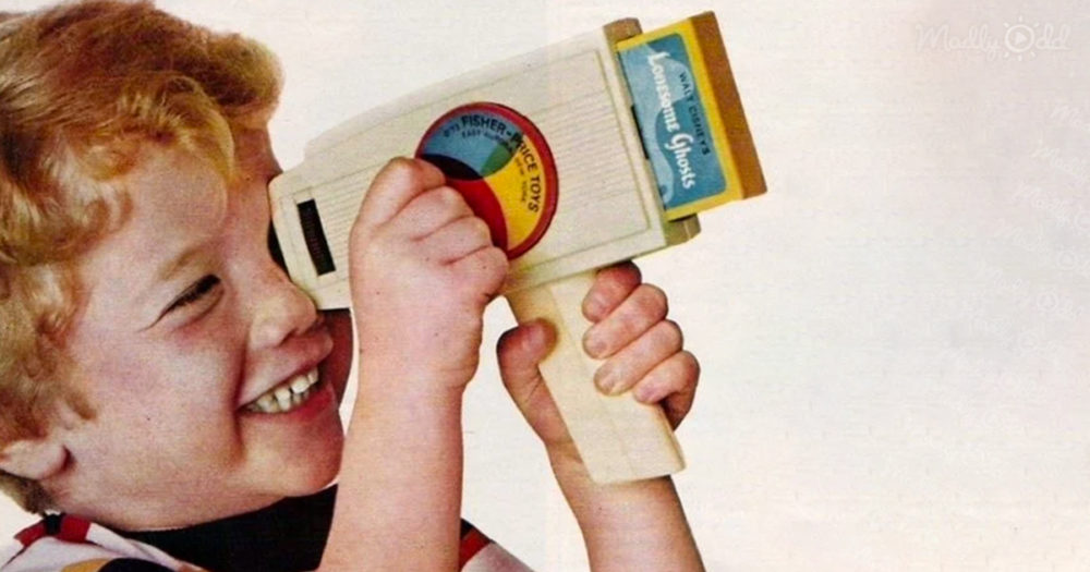 Kid with Fisher-Price&rsquo;s Movie Viewer