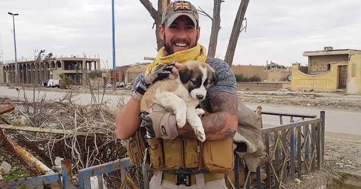 Orphaned puppy adopted by soldier