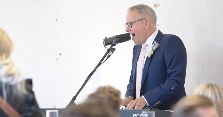 Dad singing at daughter's wedding