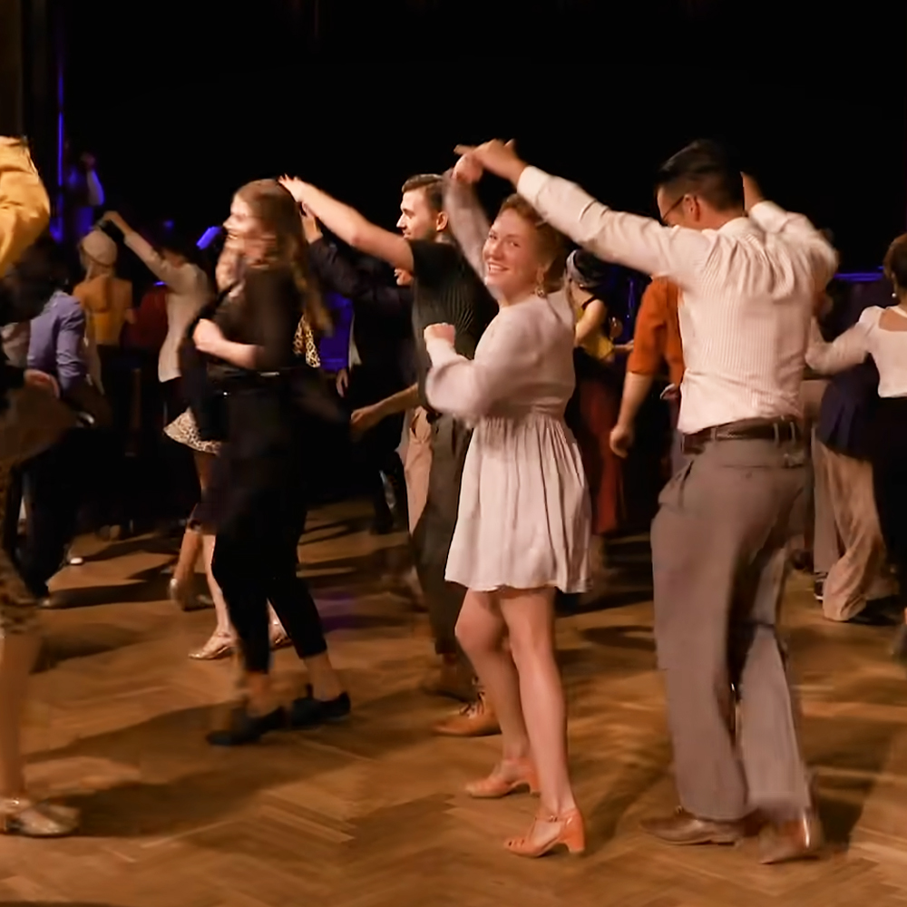 Couples performing jaw-dropping swing dance