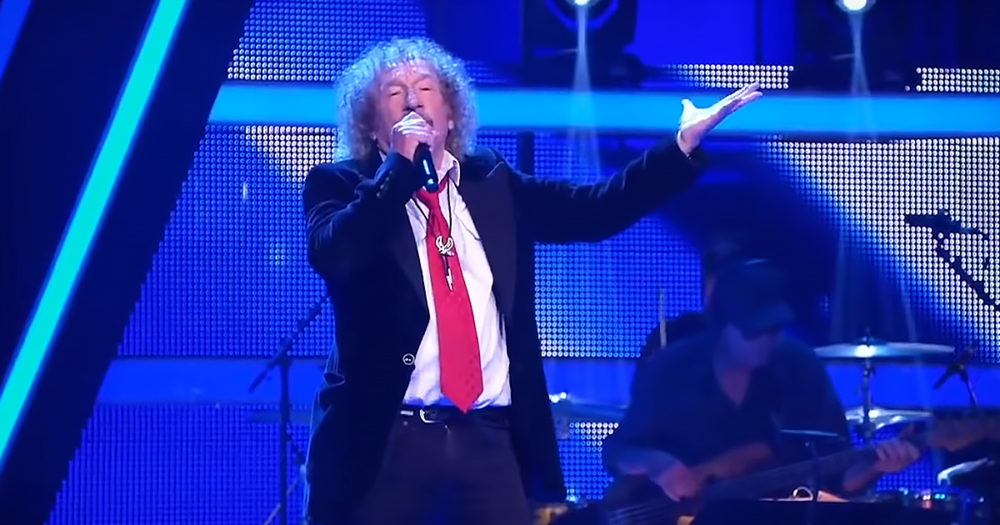 Senior man singing on The Voice