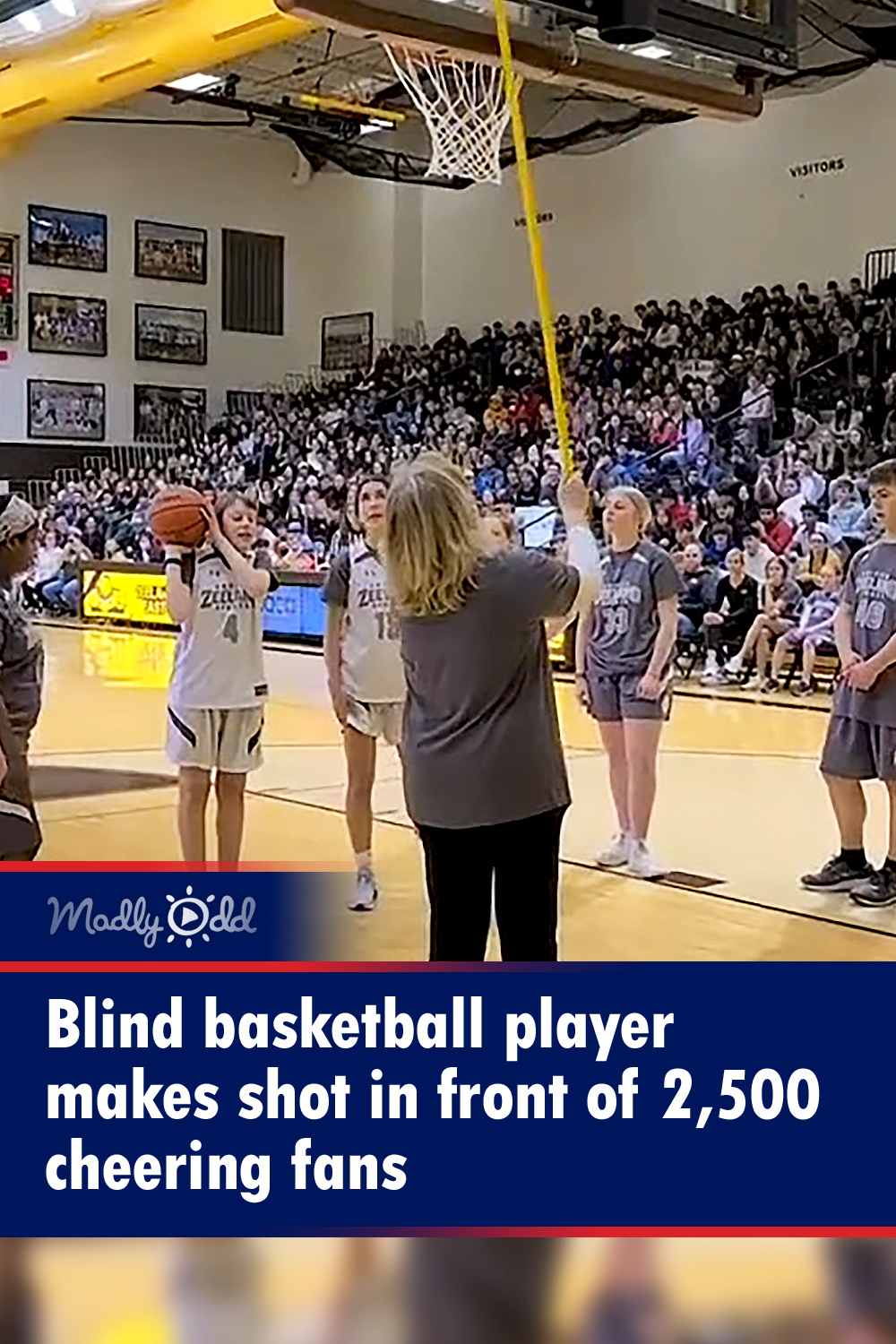 Blind basketball player makes shot in front of 2,500 cheering fans