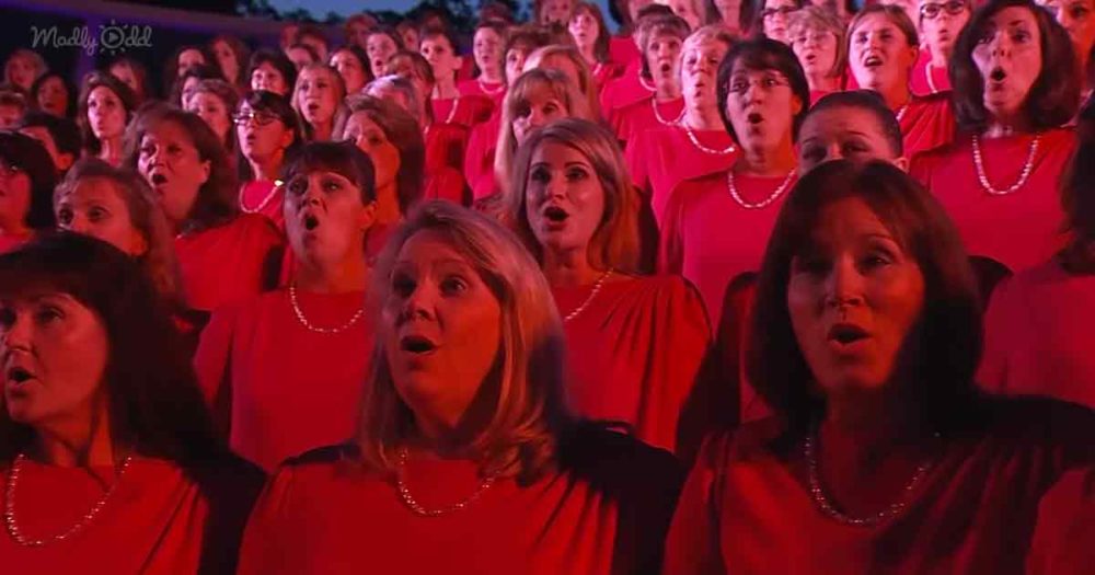 Massive outdoor choir performs powerful “Battle Hymn” ballad Madly Odd!