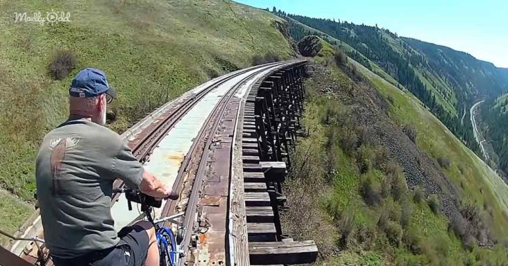 Extreme bikers riding on abandoned railroads