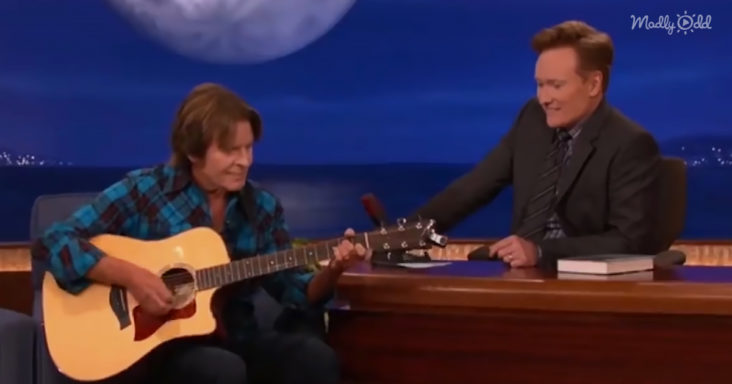 John Fogerty singing "Have You Ever Seen the Rain”