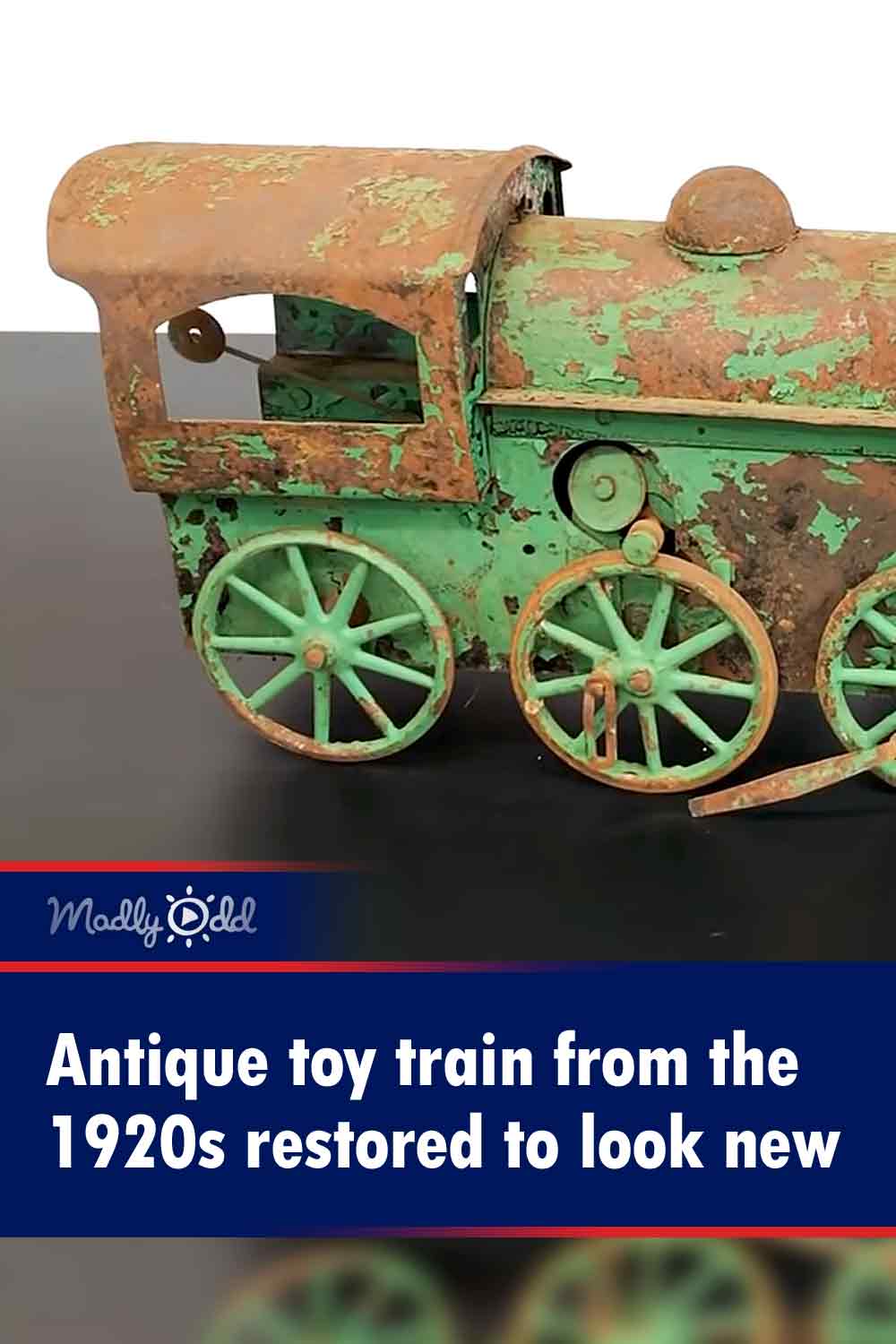 Antique toy train from the 1920s restored to look new