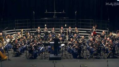 Bagpiper performs AC/DC's 'Thunderstruck,' breathes fire through bagpipes