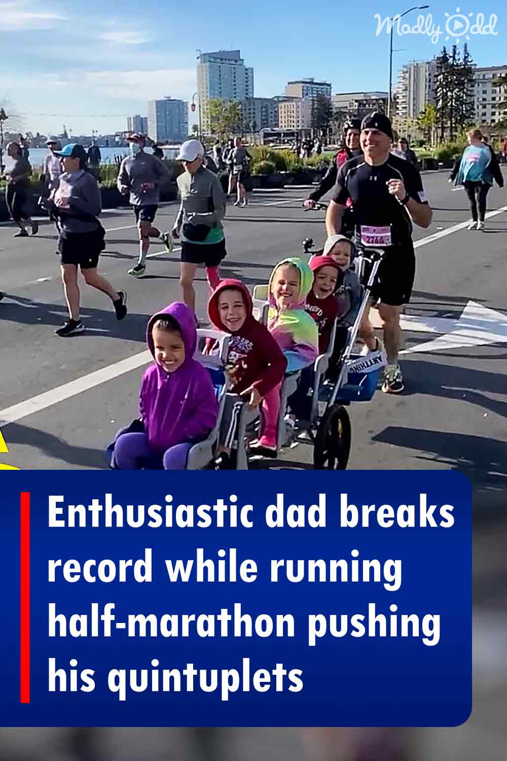 Enthusiastic dad breaks record while running half-marathon pushing his quintuplets