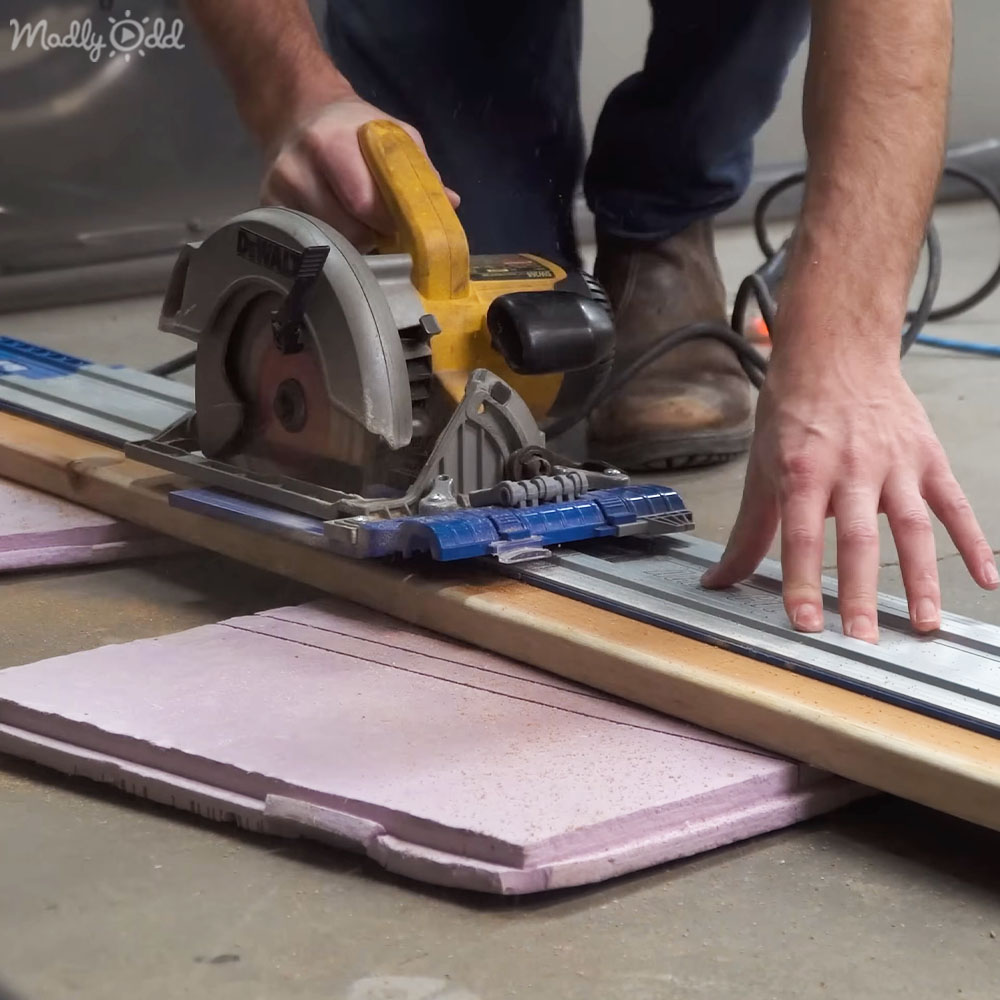 Man building insulated dog house