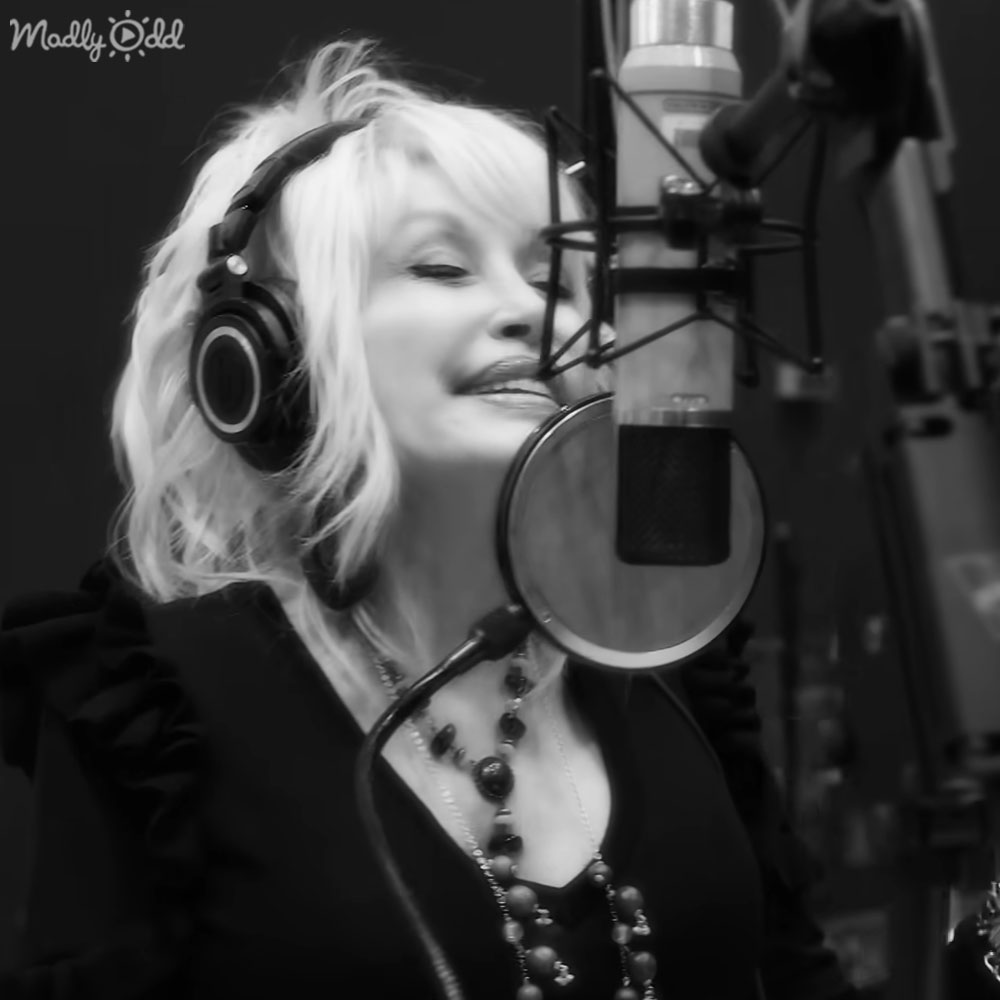 Dolly Parton with her guitar