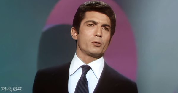 Sergio Franchi, in a formal suit, delivering 'Time Alone Will Tell' with a stage set reminiscent of the late 1960s.