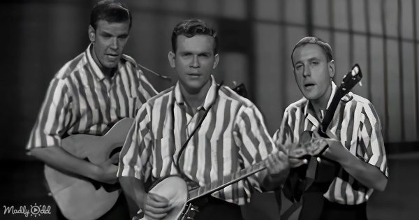The Kingston Trio singing together