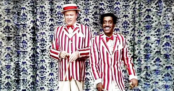 Vintage 1980s TV studio set with spotlights illuminating two legendary performers