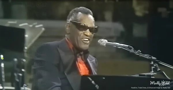 Ray Charles performs at grand piano inside medieval German monastery, ornate Baroque architecture and stone columns frame the scene. Dramatic lighting highlights his iconic profile and elegant attire with gold cufflinks catching the light.